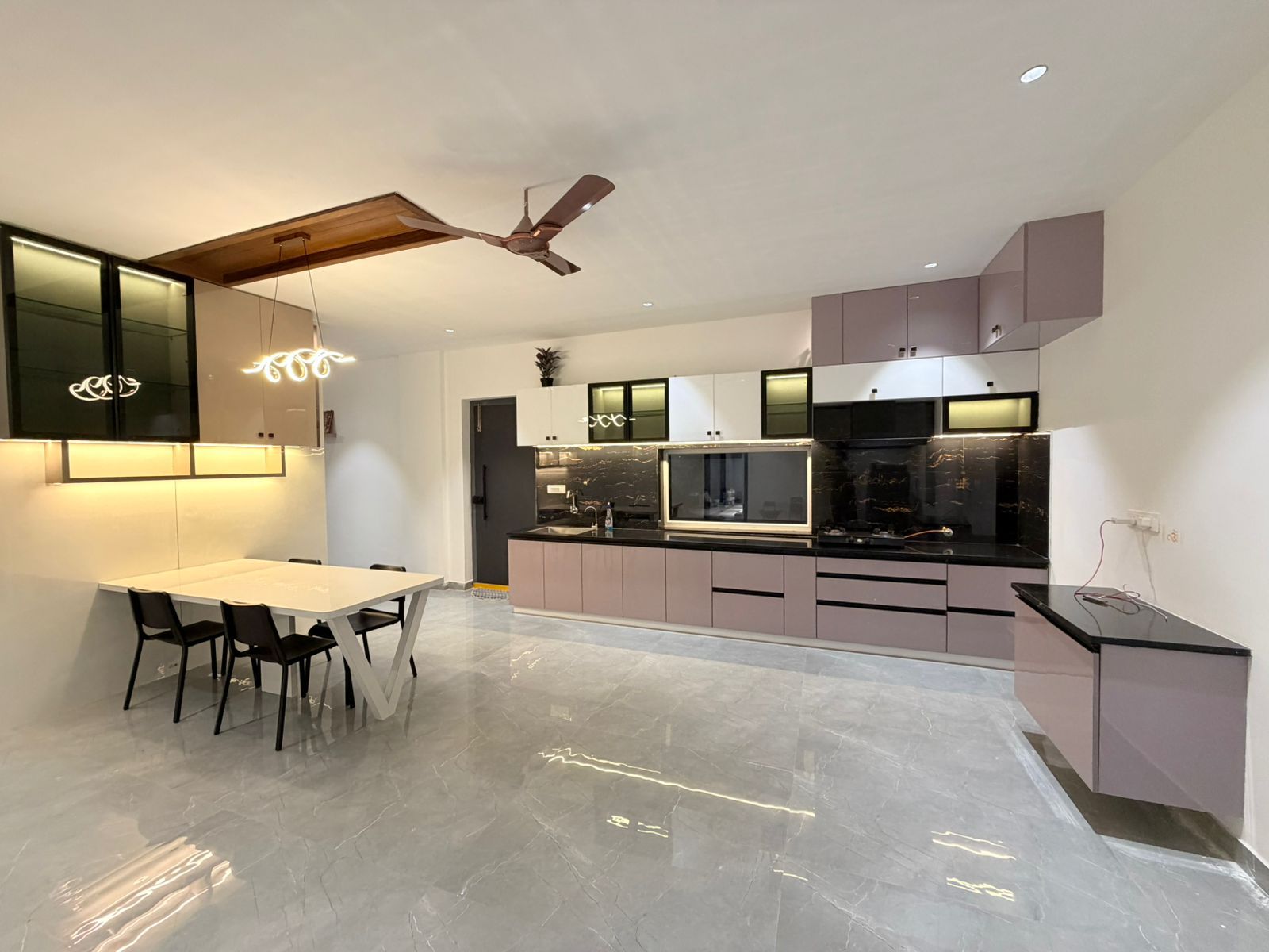 Grand designer kitchen inside D Treatfarms 4BHK villa Hyderabad